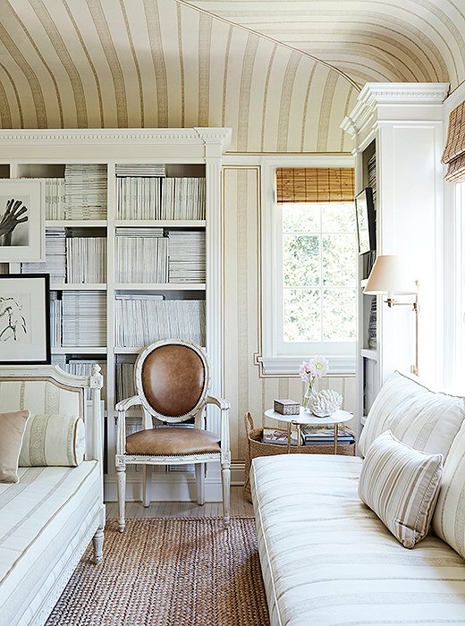 In lieu of color, this room relies on texture—the sisal rug, the matchstick blind, the leather chair upholstery (not truly Gustavian, but in the same quietly sophisticated spirit)—for contrast. Photo by Joe Schmelzer.
